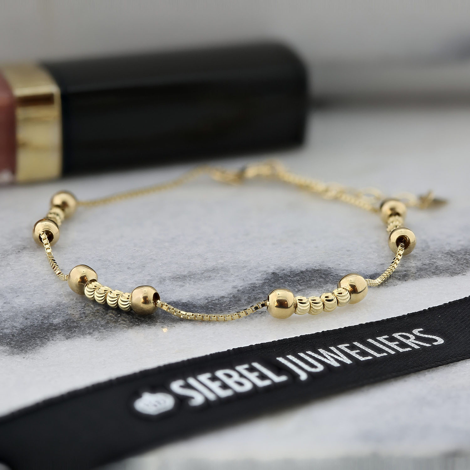 Geelgouden armband met gediamanteerde kralen B515-18U30-BCB0021-Y