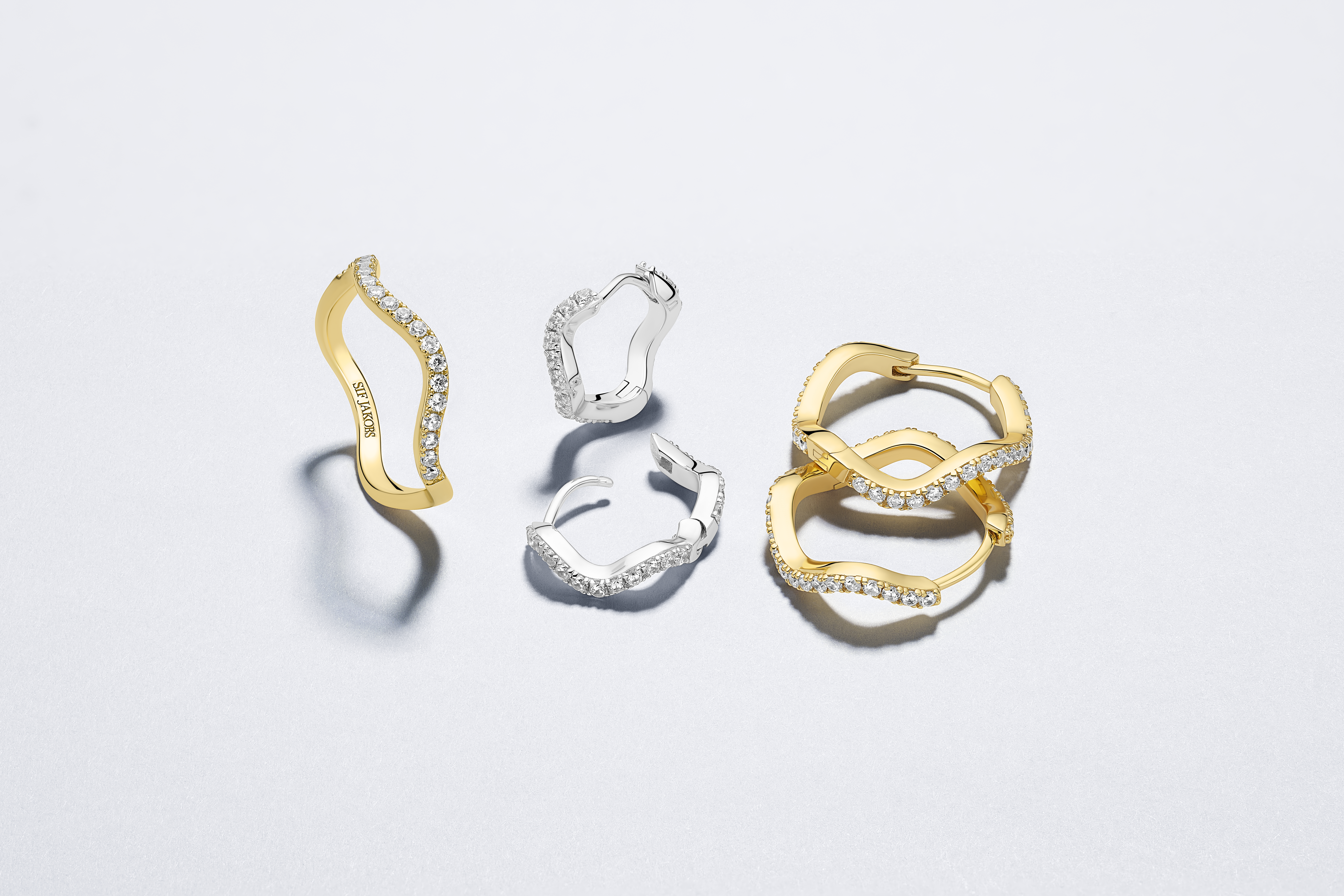 Ring Ellera Waves gold plated met zirkonia - SJ-R3869-CZ-YG