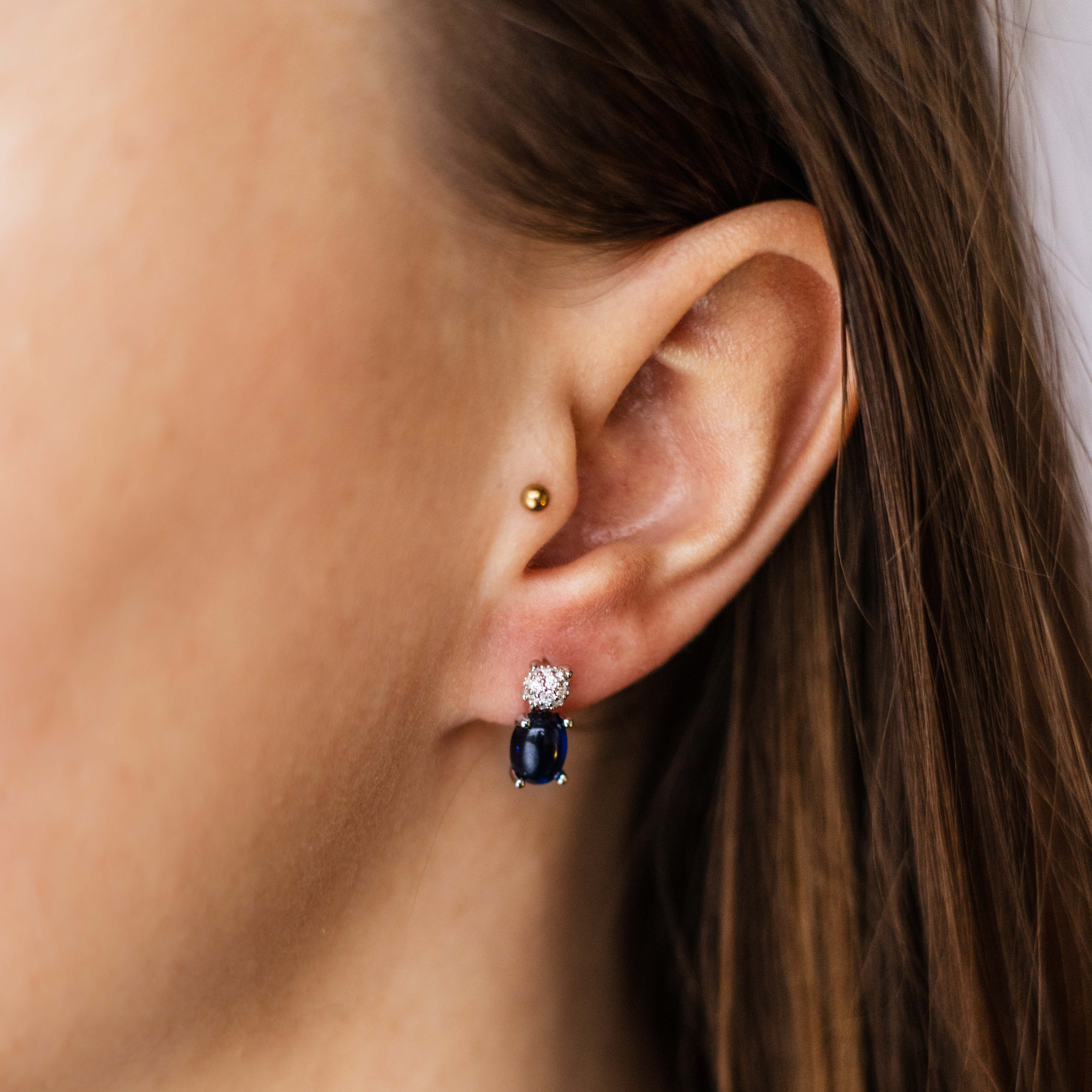 Sterling zilveren oorknoppen met zirkonia en blauwe steen E1081B