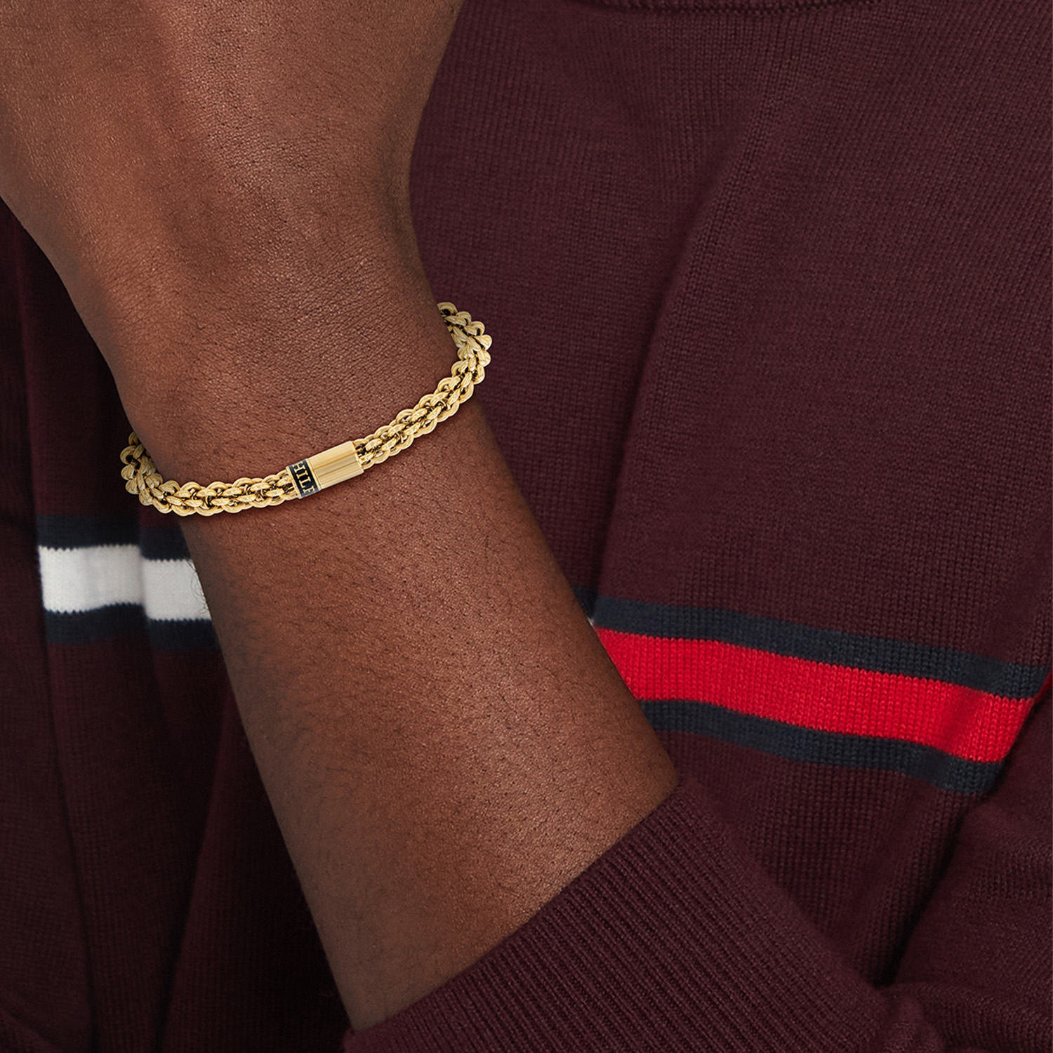 Stalen schakelarmband goudkleurig met logo TJ2790522